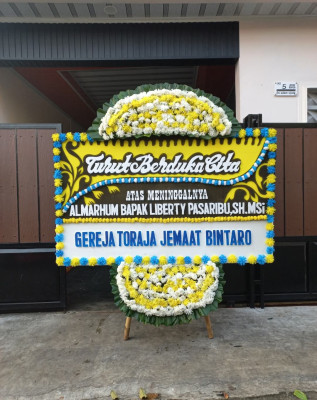 Papan Bunga Duka di Ungga